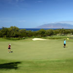 Wailea Gold Course Hole 5 on Maui with coastline and Molokini in the background
